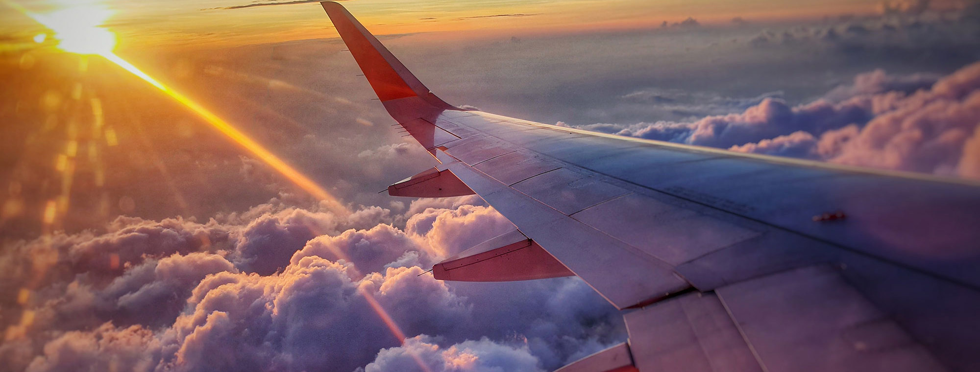 Airplane Sunset Clouds Jet Lag Expert